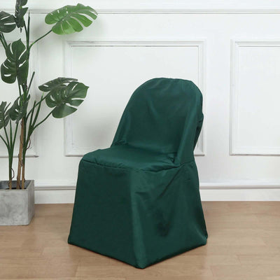 Green chair cover on a chair with a plant in a stylish interior setting.