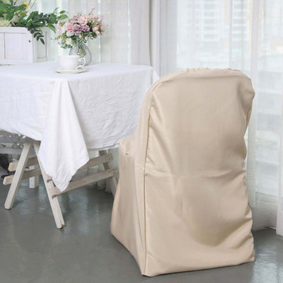 Beige chair cover on a chair beside a table in a bright room.