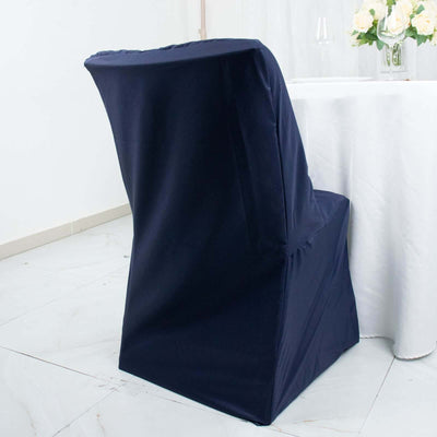 Navy blue chair cover on a dining chair at a table