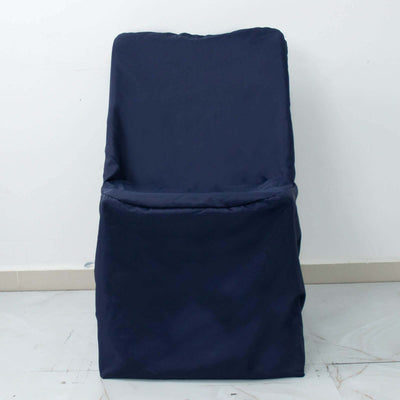 Navy blue cushioned chair on a plain backdrop