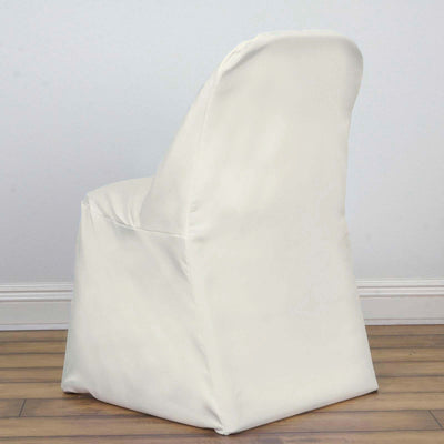 Cream-colored chair with a sleek design from a side angle.