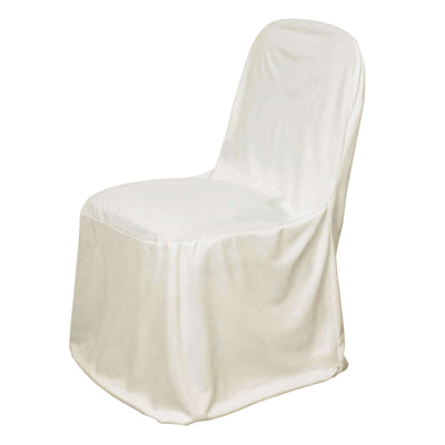 White chair cover draped elegantly over a chair for event decor.