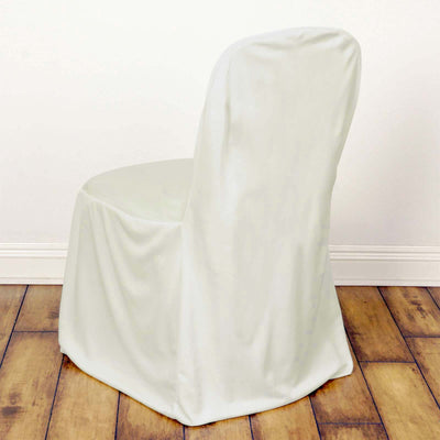 White chair cover draped over a chair against a plain background.