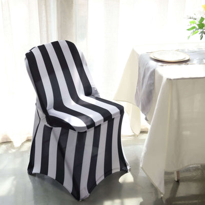 Striped chair cover in a bright, airy dining setting.