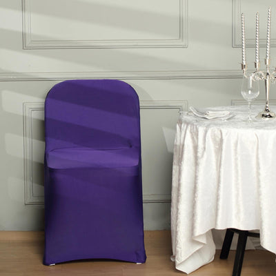 Purple chair cover on a table setting in a stylish dining room.