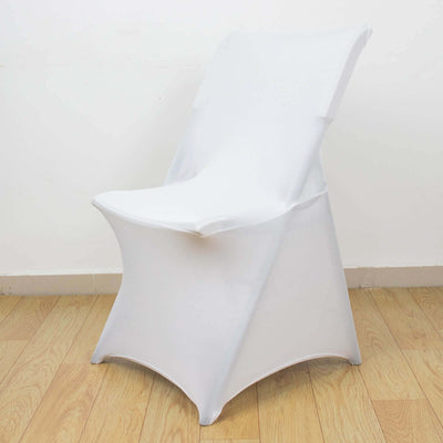 White folding chair with sleek design on wooden floor.