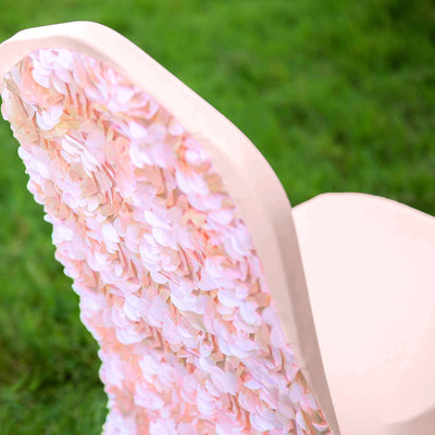 Floral backrest chair with pink and white petals on a green background.