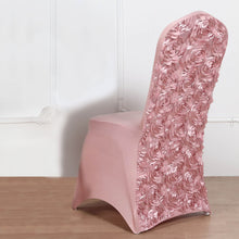 A dusty rose satin and spandex fitted chair cover with a floral pattern