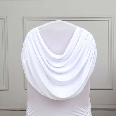 White draped fabric on a mannequin showcasing elegant design.