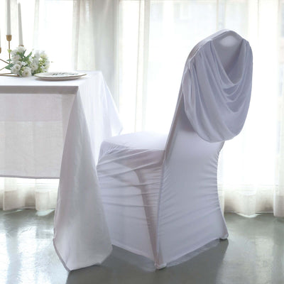 White chair cover draped elegantly over a chair in a bright, airy setting.