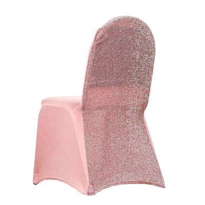 Pink glitter chair cover on a plain backdrop.