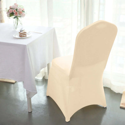 Elegant beige dining chair beside a table in a bright room.