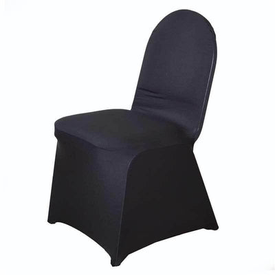 Black fitted chair cover on a sleek dining chair