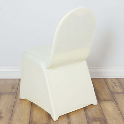 White molded chair with curved backrest and sleek design