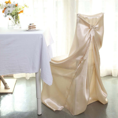 Elegant satin chair cover draped gracefully over a chair in a bright indoor setting.