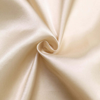 Satin fabric swirl in soft ivory color, showcasing smooth texture and sheen.