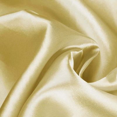 Soft gold satin fabric with a smooth, luxurious texture.