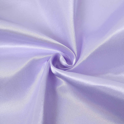 Purple satin fabric swirl texture detail.