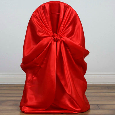 Red satin fabric draped elegantly, showcasing its luxurious texture and vibrant color.