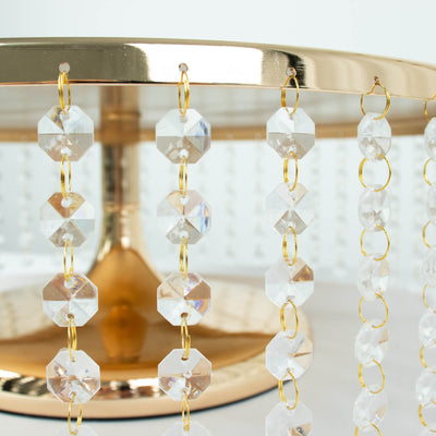 Gold and crystal beaded chandelier close-up detail shot.