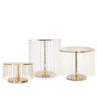 Set of three elegant crystal beaded side tables in gold finish.