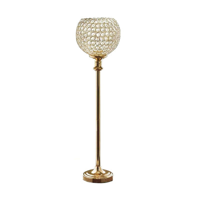 Gold floor lamp with crystal shade, elegant design for modern decor.