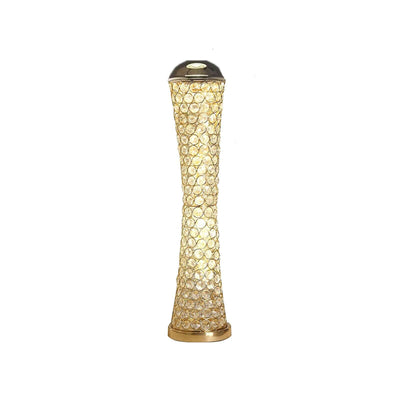 Elegant gold and crystal table lamp with a modern design.