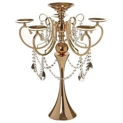 Gold candelabra with crystal accents and five candle holders