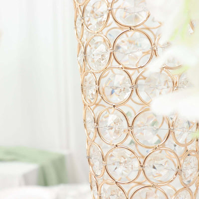 Elegant crystal vase with gold geometric design.