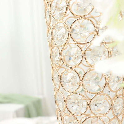 Elegant gold and crystal vase with intricate design.