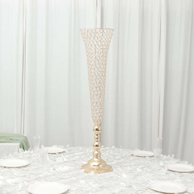 Elegant gold decorative vase with intricate design, perfect for events.