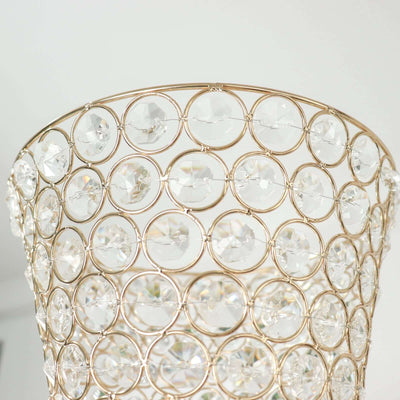 Elegant crystal vase with intricate gold wire design.