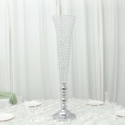 Elegant crystal vase with a chrome base, perfect for floral arrangements.