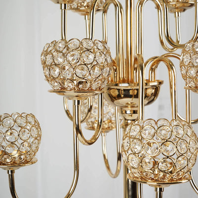 Elegant gold chandelier with crystal accents.