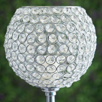 Crystal decorative lamp with a round design and metallic base.