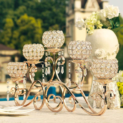 Elegant crystal candle holder with ornate design and sparkling accents.