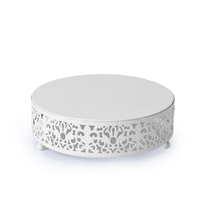 White round coffee table with intricate cutout design
