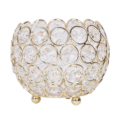 Crystal decorative bowl with gold accents and circular design.