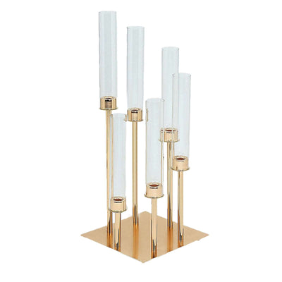 Elegant gold and glass candle holder with multiple clear tubes