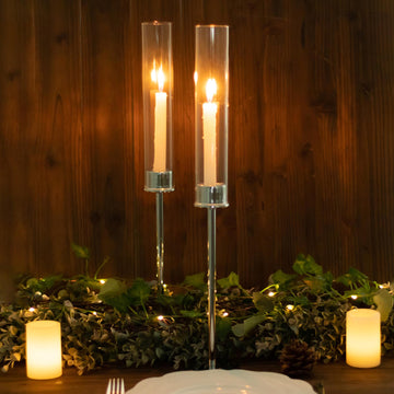 Create a Stunning Display with Tall Silver Metal Clear Glass Taper Candle Holders
