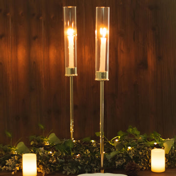 Create a Stunning Display with Gold Metal Clear Glass Taper Candlestick Holders