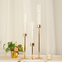 Clear Glass Hurricane Shades On Gold Metal Taper Candle Holders In 3 Sizes