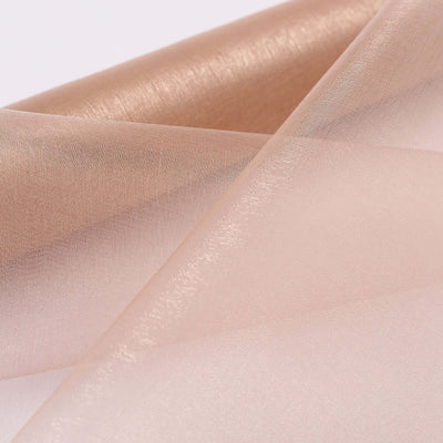 Sheer fabric in soft beige and blush tones, showcasing elegant texture.