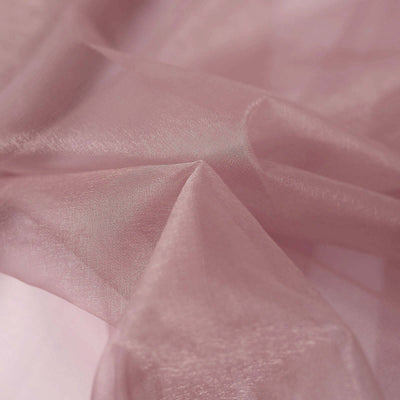 Sheer pink fabric draping softly with delicate texture details.