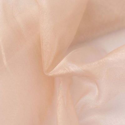 Delicate peach sheer fabric with soft folds and texture.