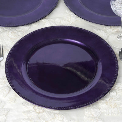 Purple decorative dinner plate on a textured tablecloth.