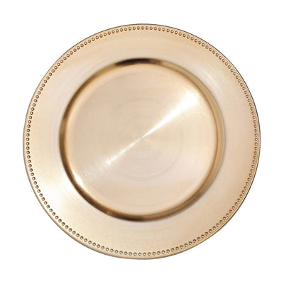 Gold charger plate with beaded rim, perfect for elegant table settings.