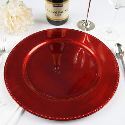 Red decorative charger plate for elegant dining settings