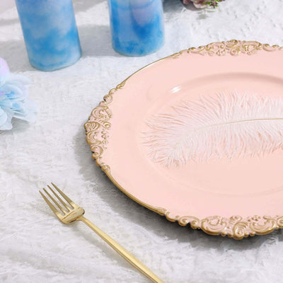 Elegant pink plate with feather design, gold accents, and decorative fork.
