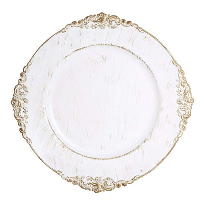 Elegant white plate with gold rim and intricate detailing.